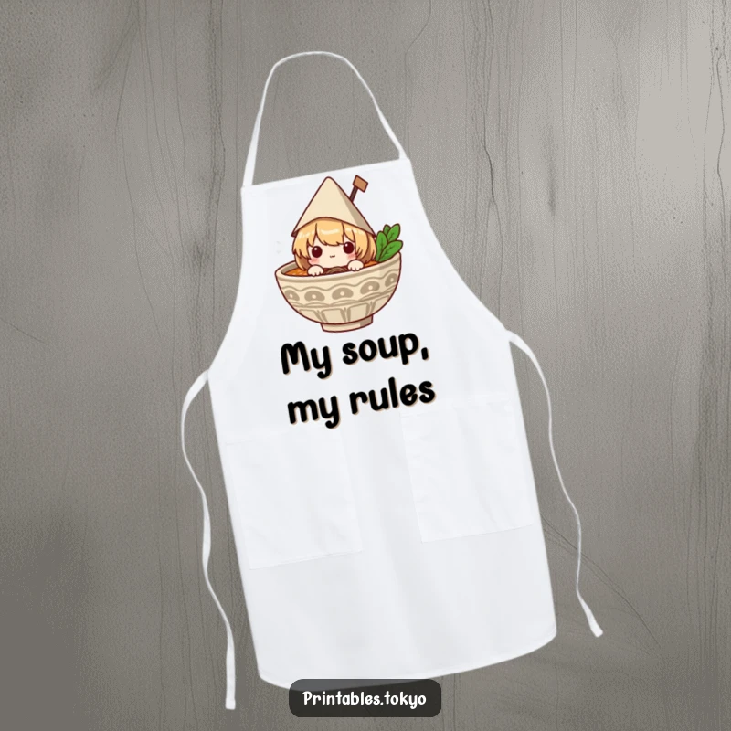 Funny apron for cooking, showing a cute character in a paper hat peeking out of a ramen bowl, ready to serve delicious food.