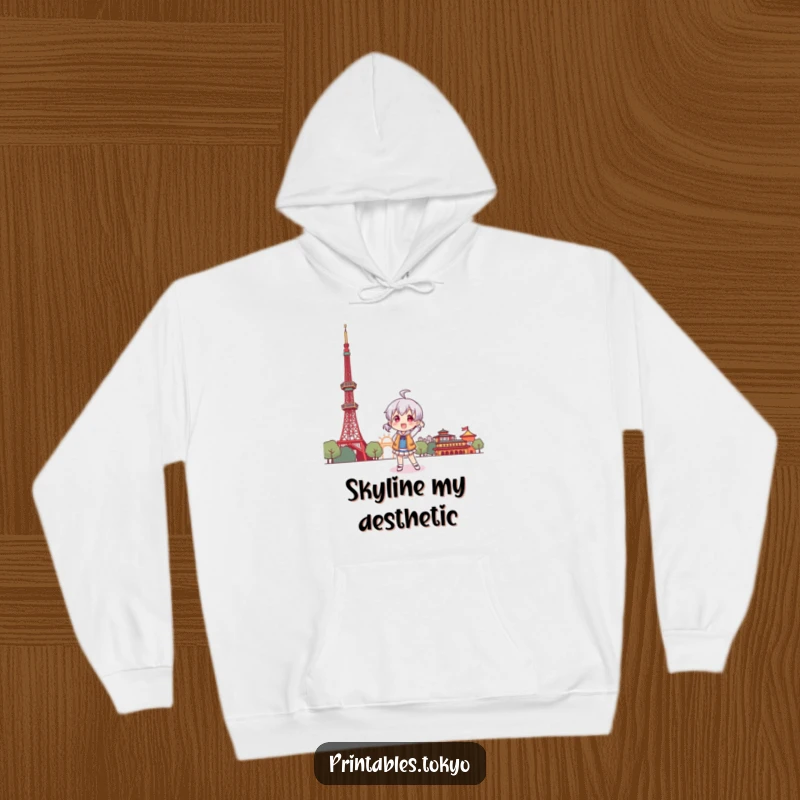 Funny hoodie featuring a character striking a humorous pose in front of a stylized, iconic Tokyo Tower.