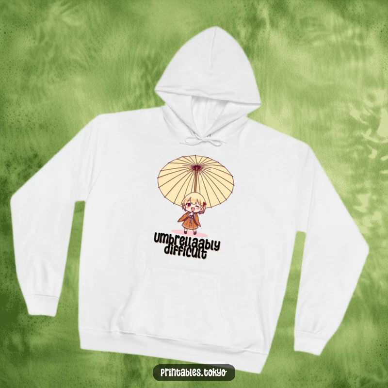 Funny umbrella struggle hoodie, a character comically wrestling an oversized Japanese umbrella, offering warmth and humorous relatability.