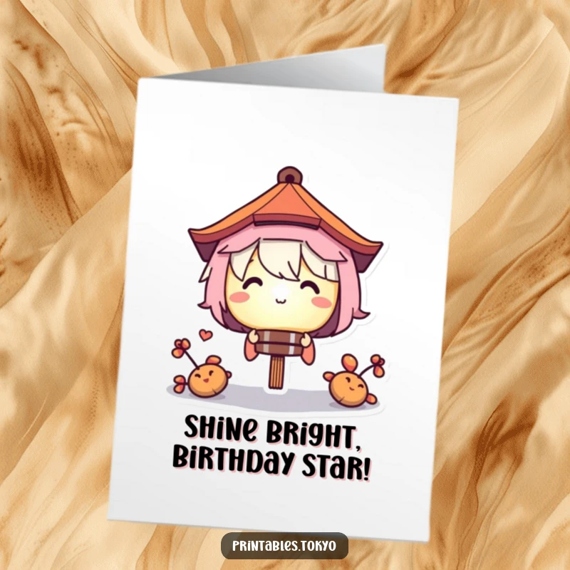 Funny Free Printable Birthday Card: Character peeks mischievously from behind a softly glowing paper lantern. Unique downloadable gift idea.