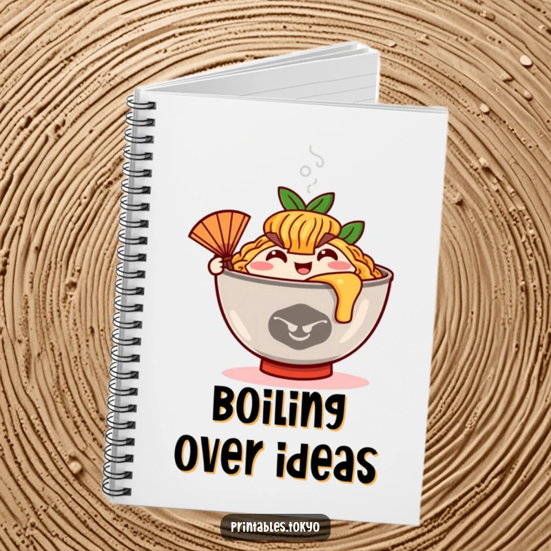 Funny ramen bowl character with steam and a small fan, featured on the cover of a creative and fun notebook.